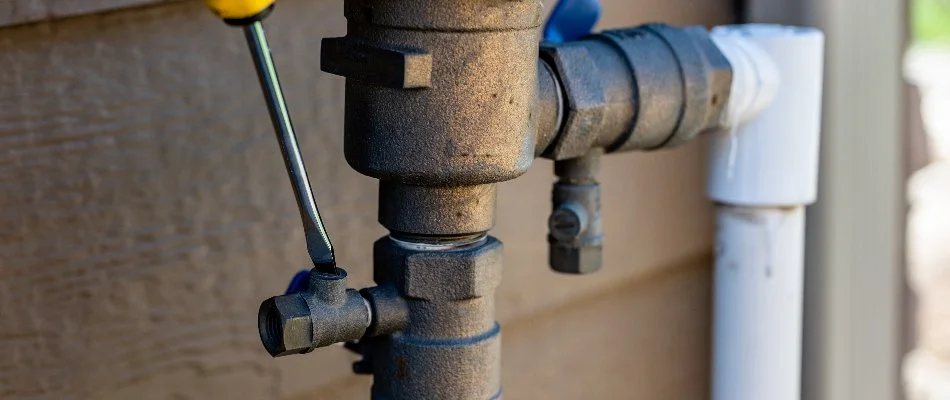 Shutting off the water supply to an irrigation system in Tarrytown, NY.