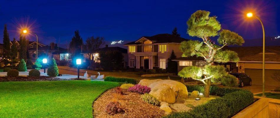 Front yard landscape in Fairfield, CT, with outdoor lighting.