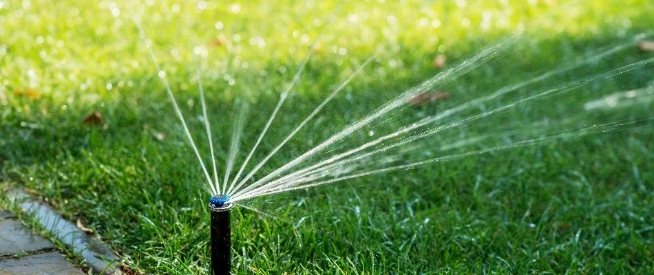 Green lawn with sprinkler irrigation in Ramsey, NJ.