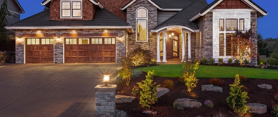 Home illuminated by outdoor lighting in Greenwich, CT.