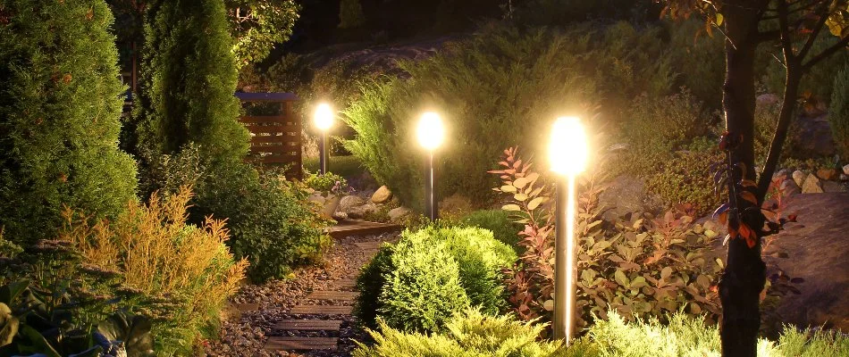 Outdoor LED lights on a landscape in Dobbs Ferry, NY, with a pathway.